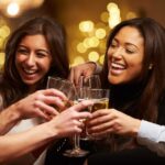Group Of Friends Enjoying Evening Drinks In Bar