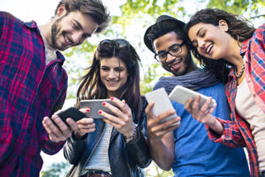 social media networking friends texting smartphones getty